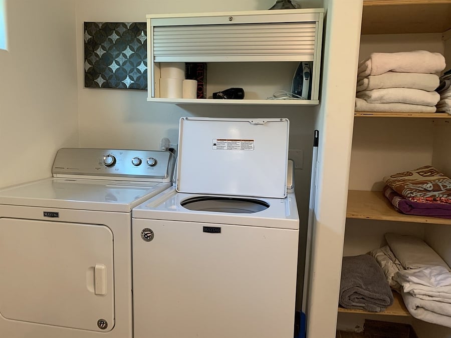 Laundry and linen closet.
