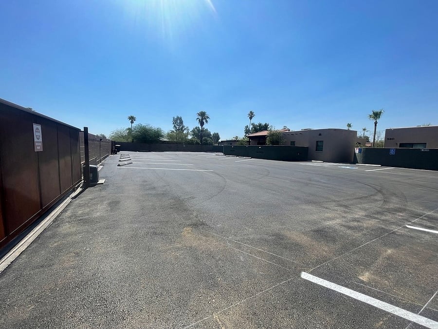 Newly paved private secure parking lot.