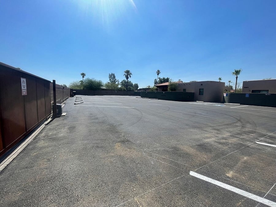 Newly paved private secure parking lot.