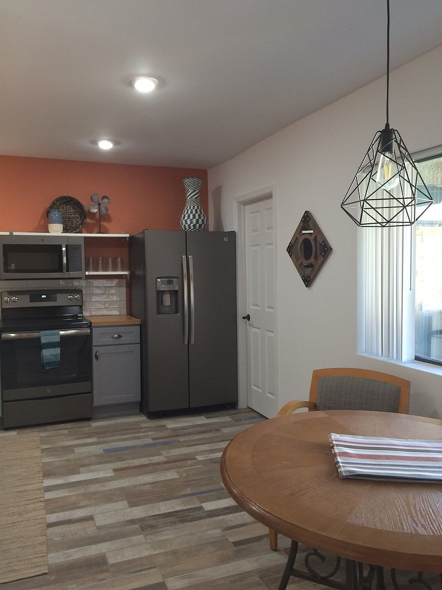 Kitchen, door next to refrigerator is laundry room.