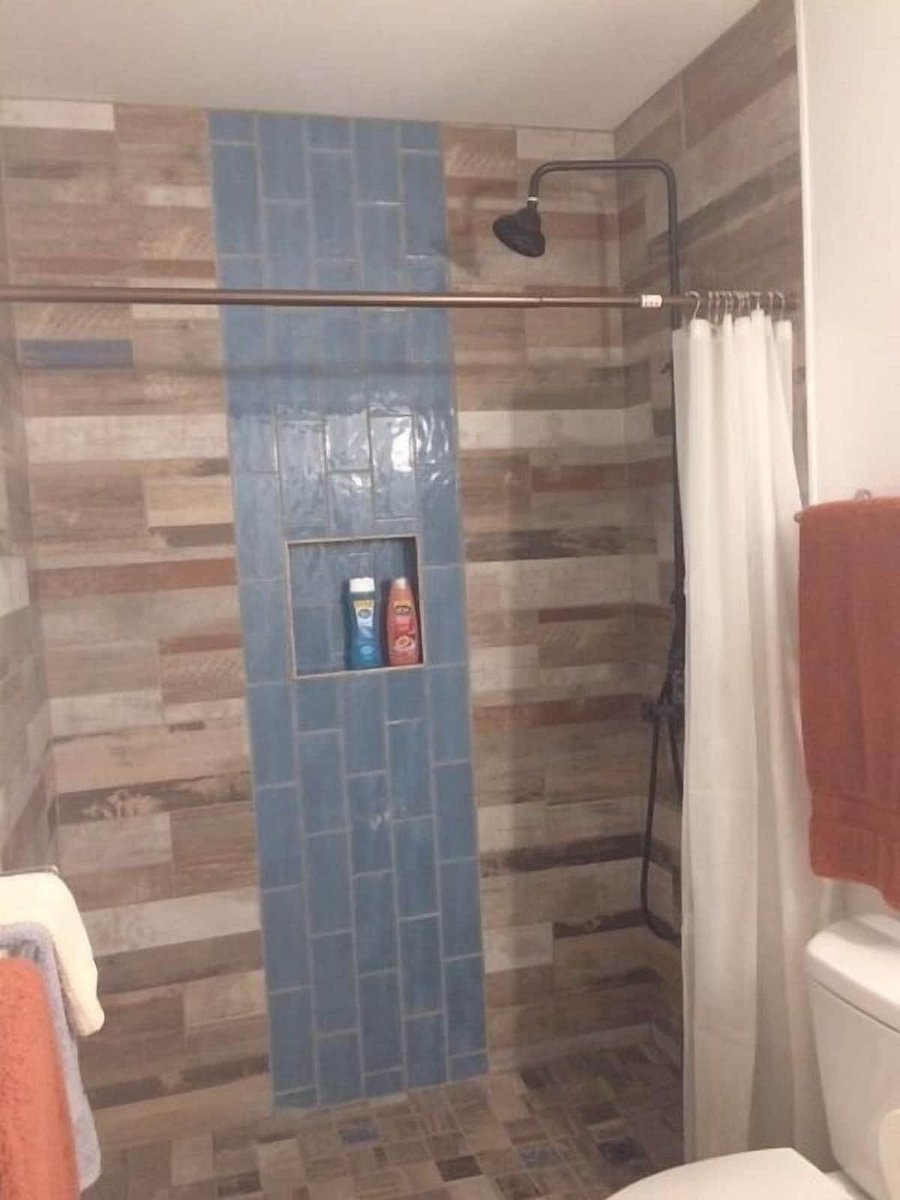 Bathroom with walk in shower.