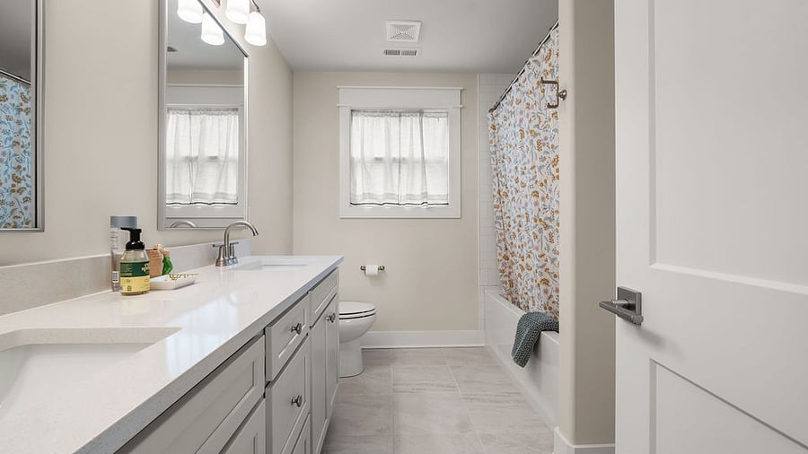 Second Floor Hall Bath with designer-weight towels by the Madison Collection, starter supplies of bath amenities 