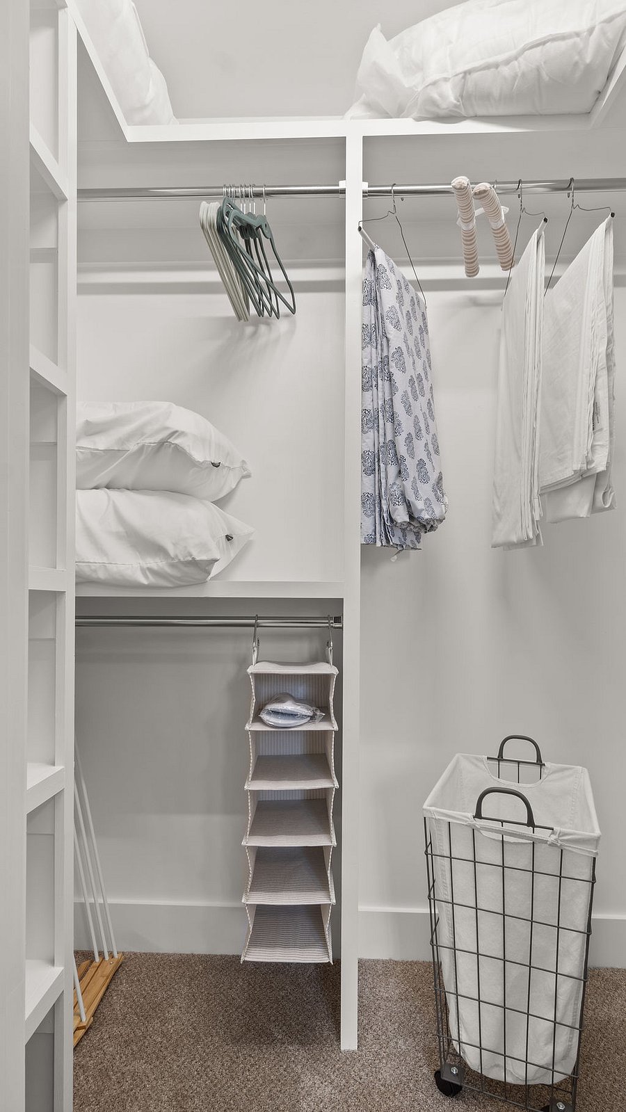 Queen room closet with laundry storage, extra sheets and pillow options for back and side sleeping with contour pillows by SERTA 