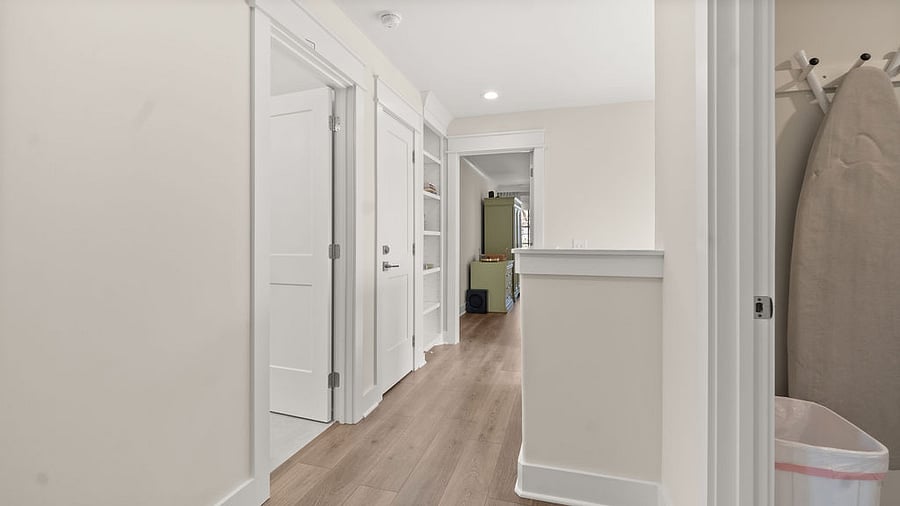 Second floor stair landing looking into Primary Suite