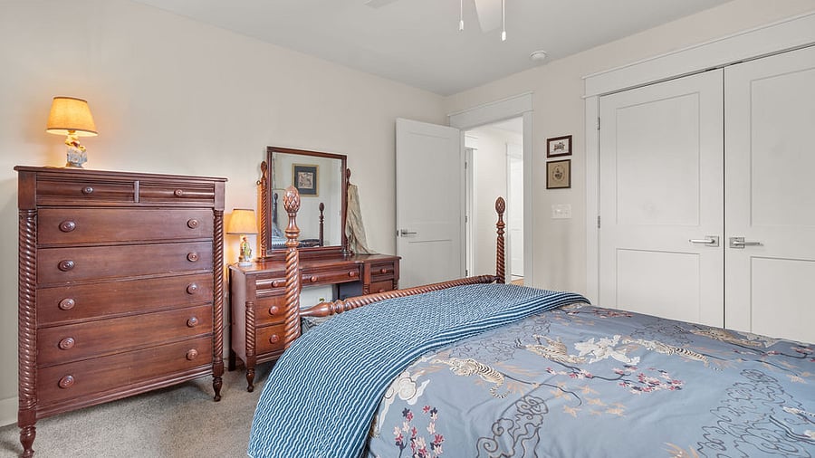 Full-size bed on the second floor with ample storage