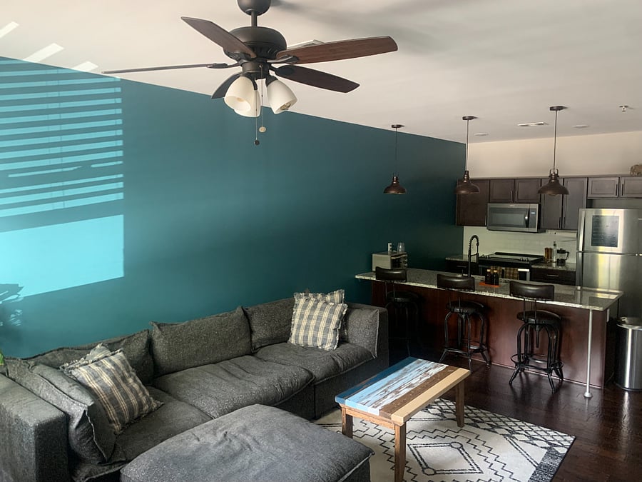 Open-concept living room. View from exterior entrance