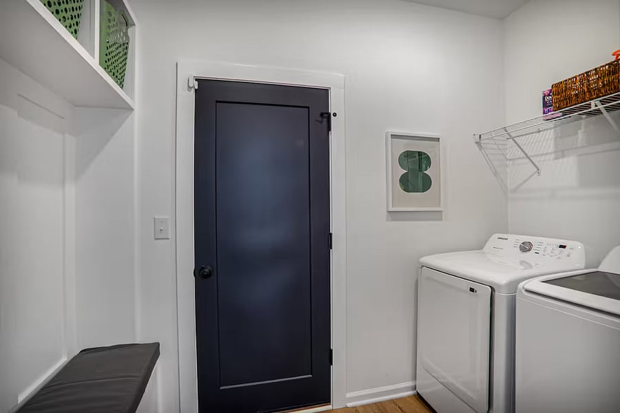 Laundry room and door to garage.