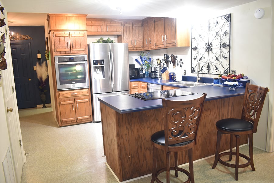 Full kitchen with dishwasher and all amenities needed for comfortable cooking (coffee maker, blender, spices, microwave, dishes, pot/pans, bakeware, etc.) 