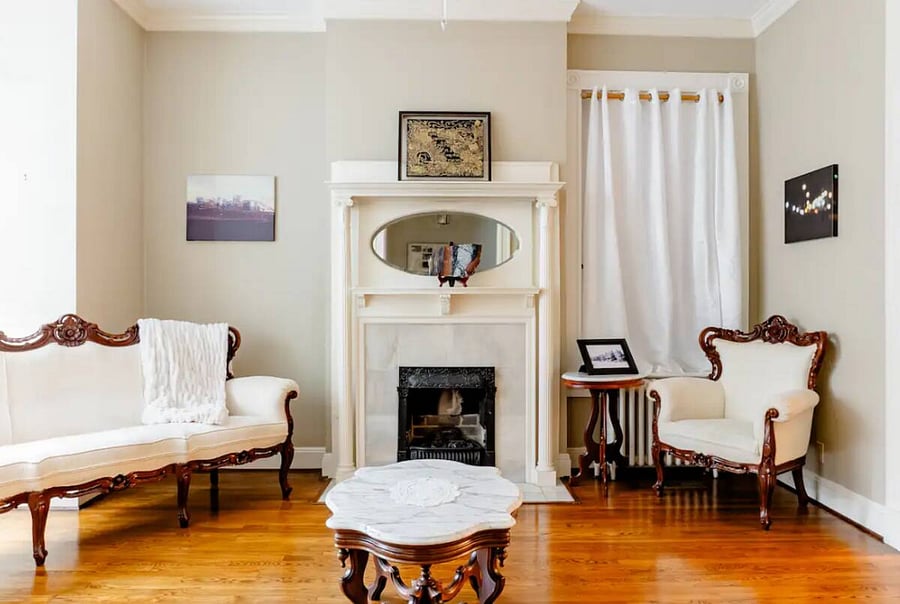 Spacious living room featuring a plush sectional and plenty of natural light.