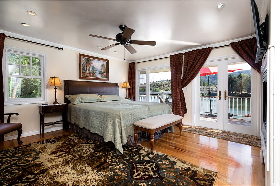 Master bedroom with its own ensuite clawfoot tub and walk in shower