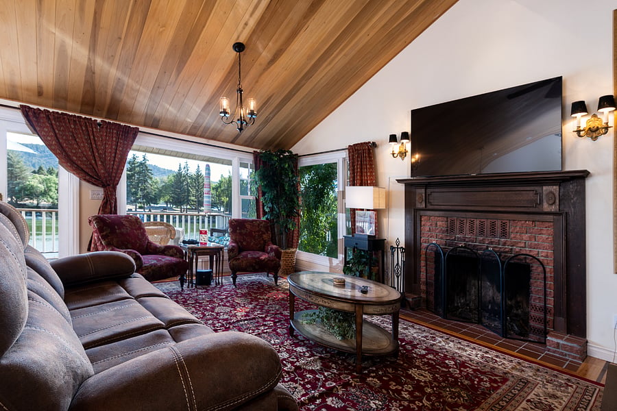 Beautiful living room with fireplace and Wi-Fi TV