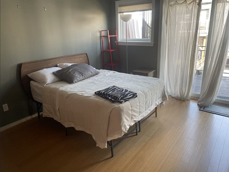 Back Bedroom has access to back and roof deck featuring a cast iron spiral staircase