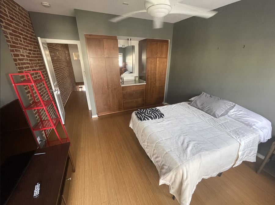 Back Bedroom features built in dresser and vanity
