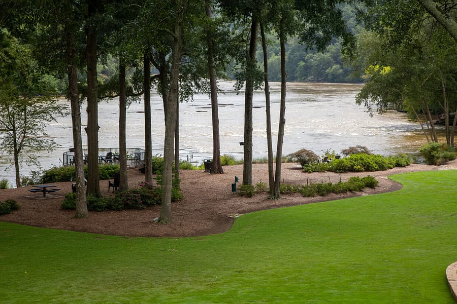 riverfron park within the complex, next to wooden trails that you can walk day or night.
