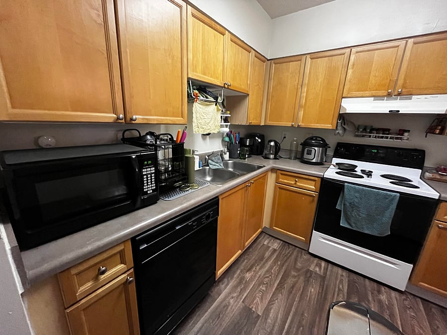 small kitchen with all the appliances you could need, air fryer, Instant Pot, blender, coffee maker.
