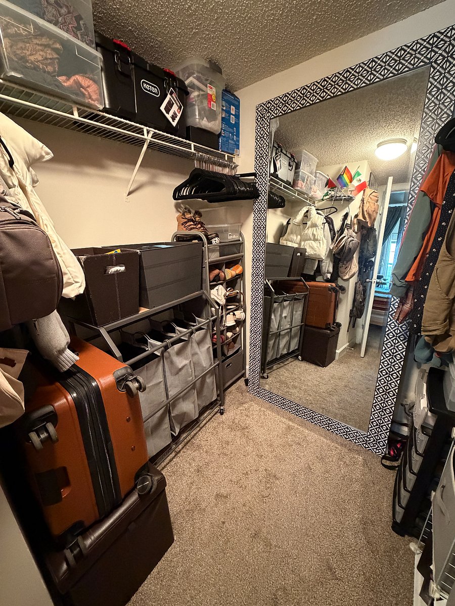 walk in closet with full length mirror