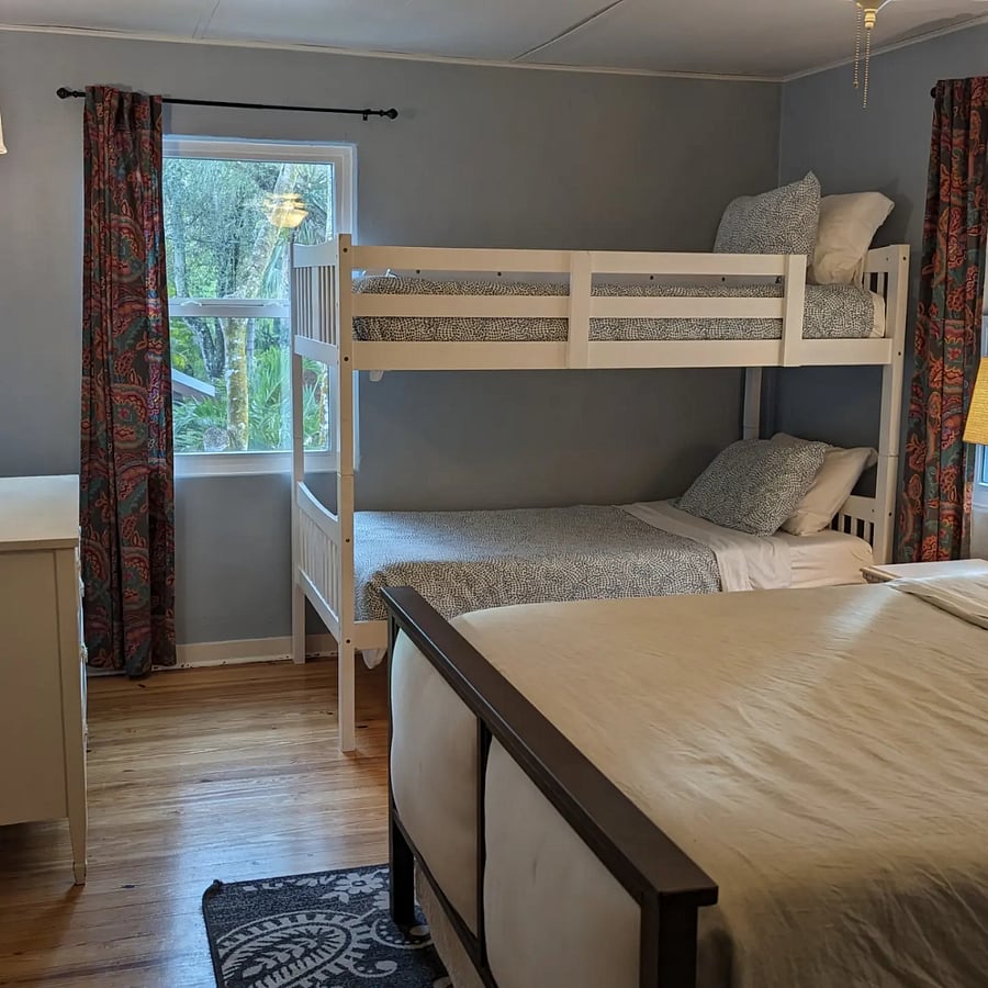 Bedroom with bunk bed and queen bed