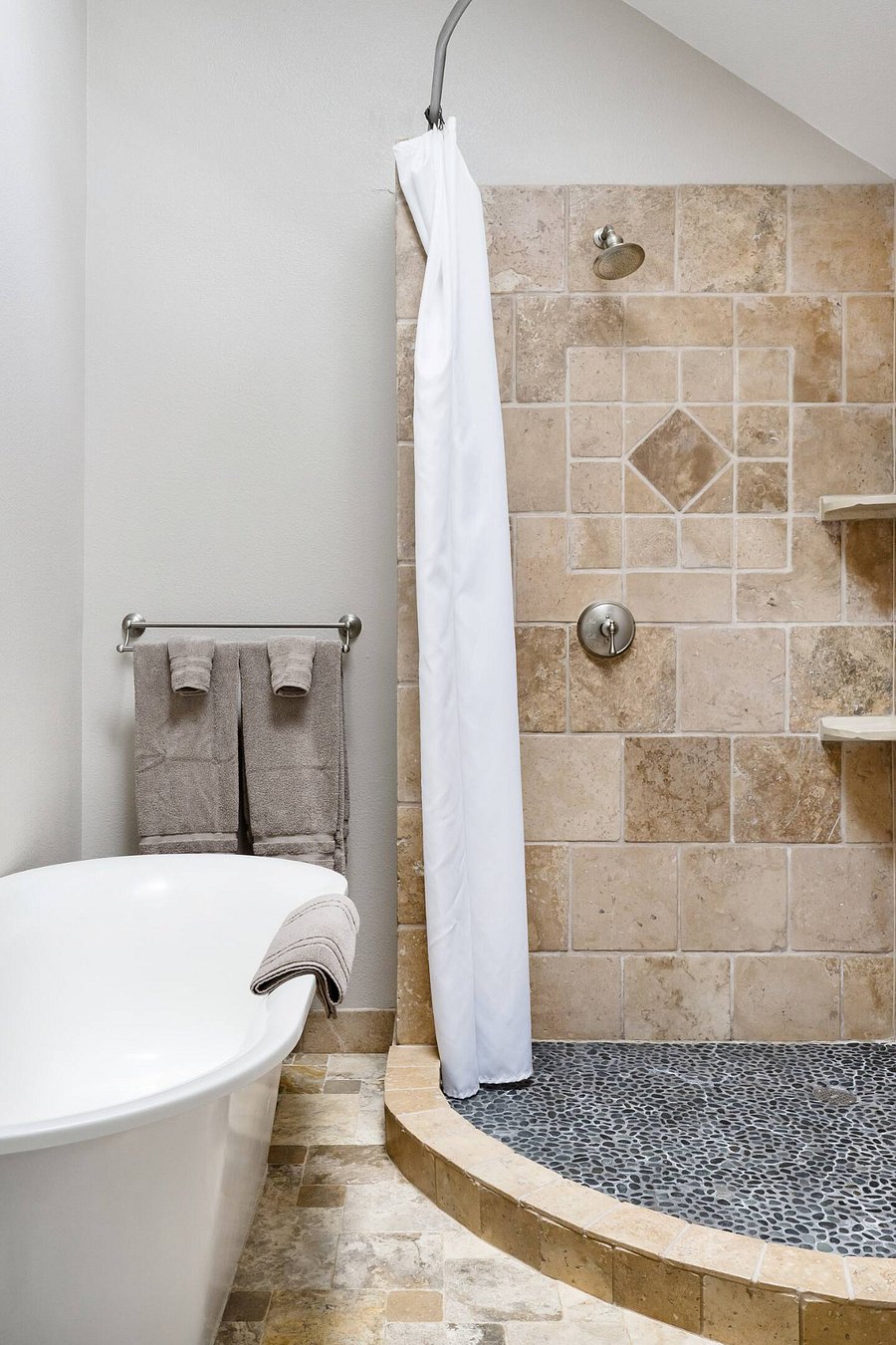 Large tub and walk-in shower in ensuite bathroom