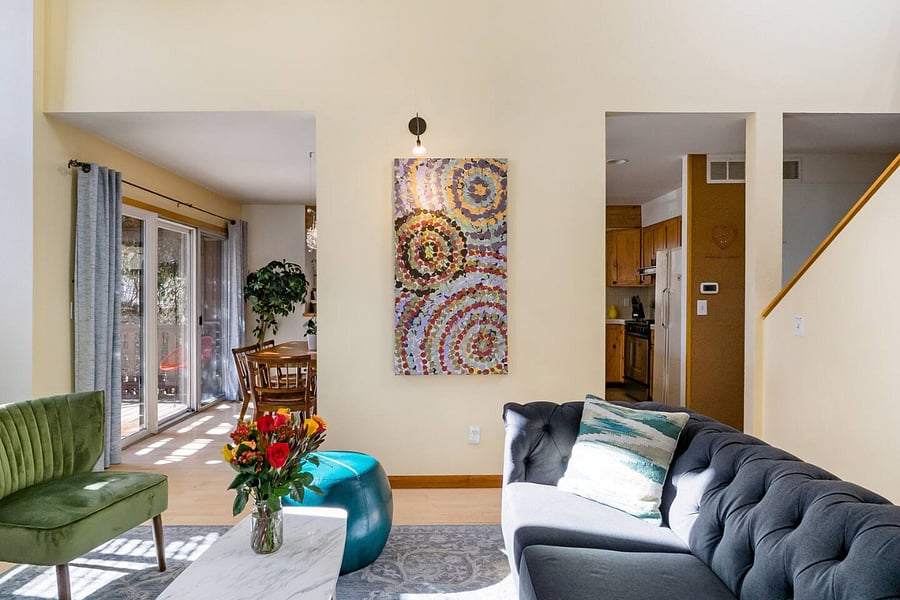 Spacious open floor plan from primary living room area into the kitchen and dining area