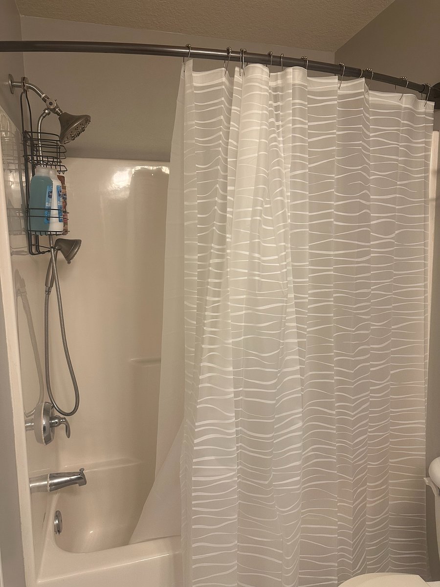 main bathroom with adjustable shower head