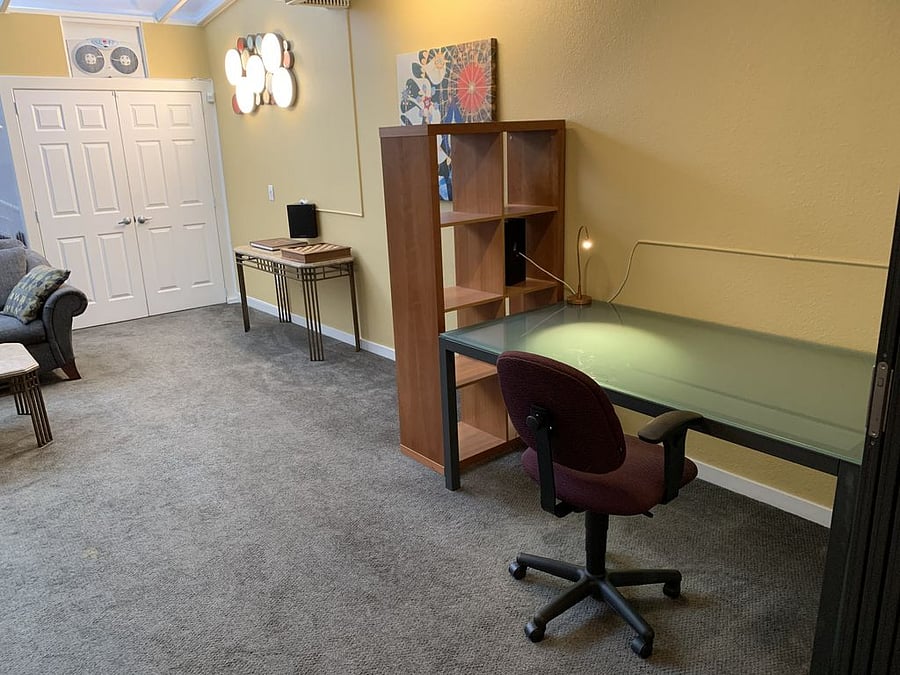 Lower-level living room work area.