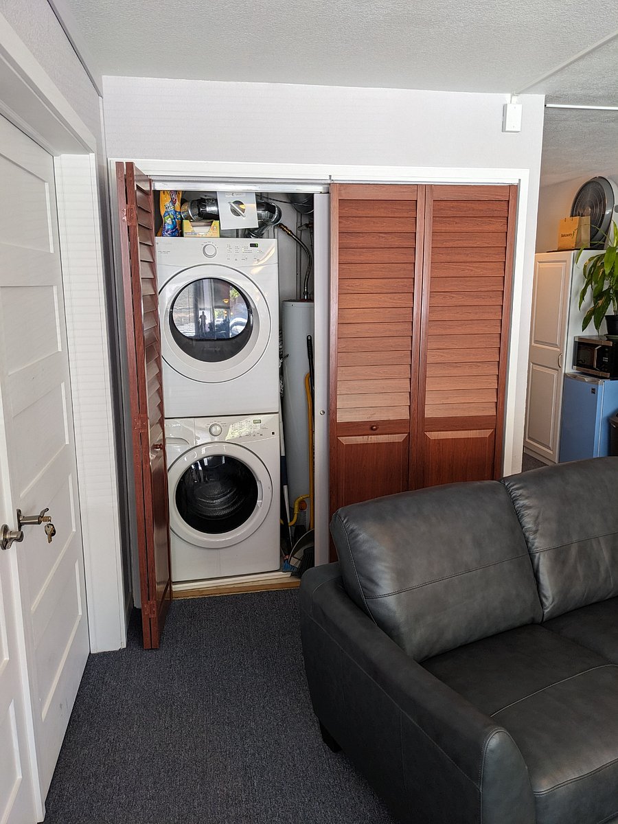 Washer/Dryer in closet off of Upper-level living room.
