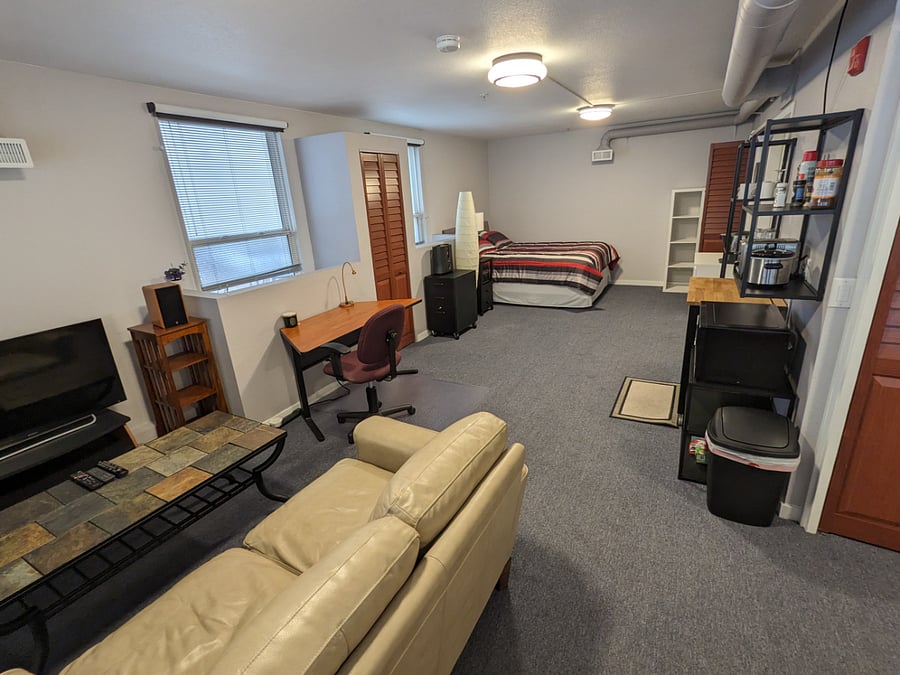 Upper-level suite TV sitting area.