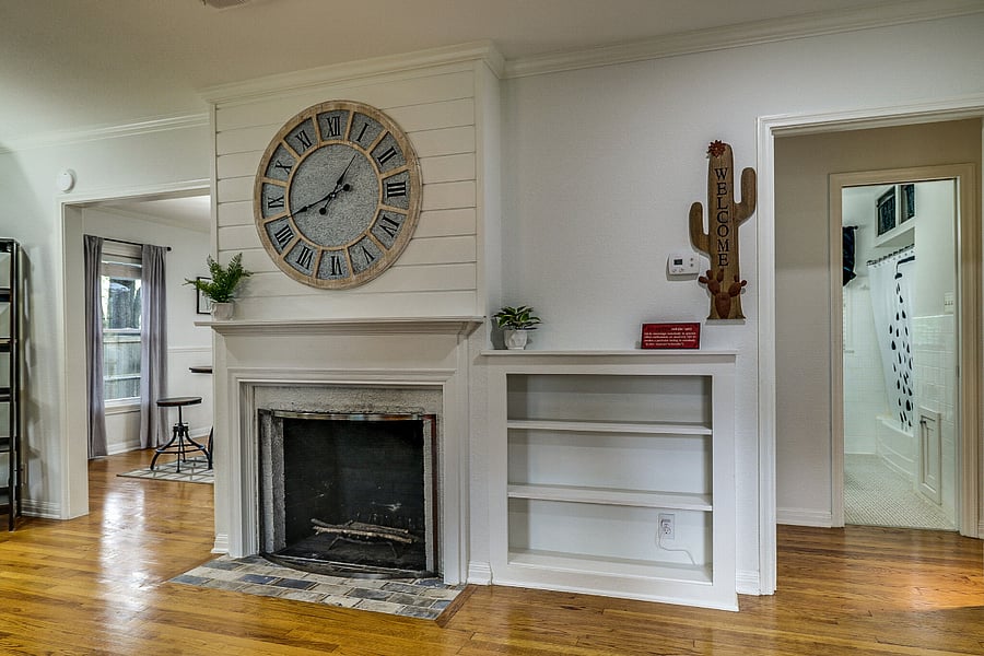 View of living room as you walk into the home with dining room to rear left and kitchen and bedrooms, bathroom to the rear right