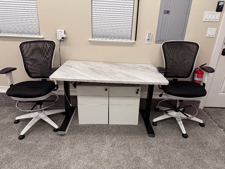 Interior Desk,
This is a sit or stand adjustable desk. It adjust the height by an electric motor and an up/down switch.