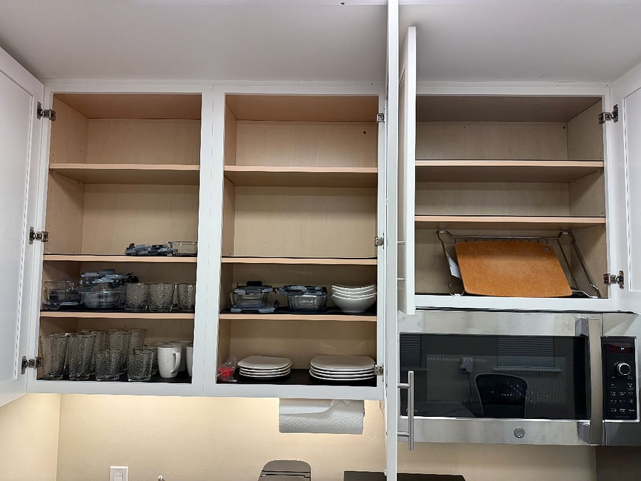 Interior Kitchen Cabinets with Dishes and Gassware