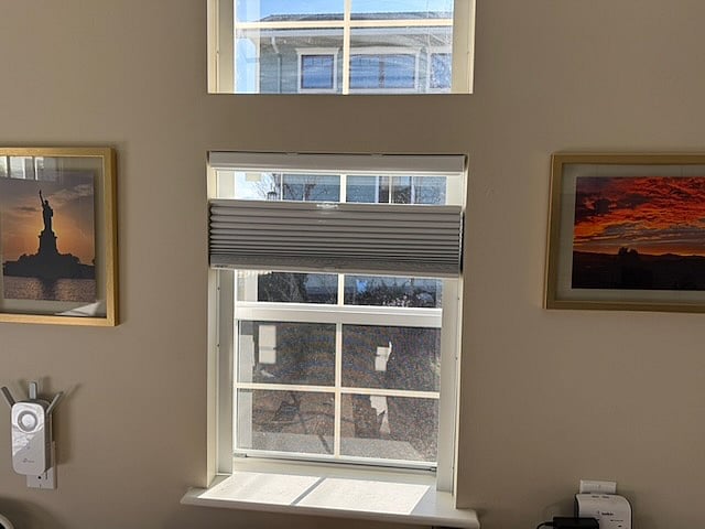 Window showing Up/Down Blackout Blind in partially lowered possition