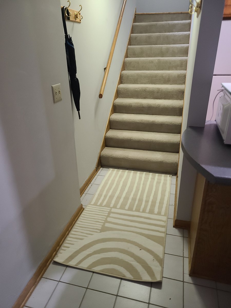 Stairway landing into apartment