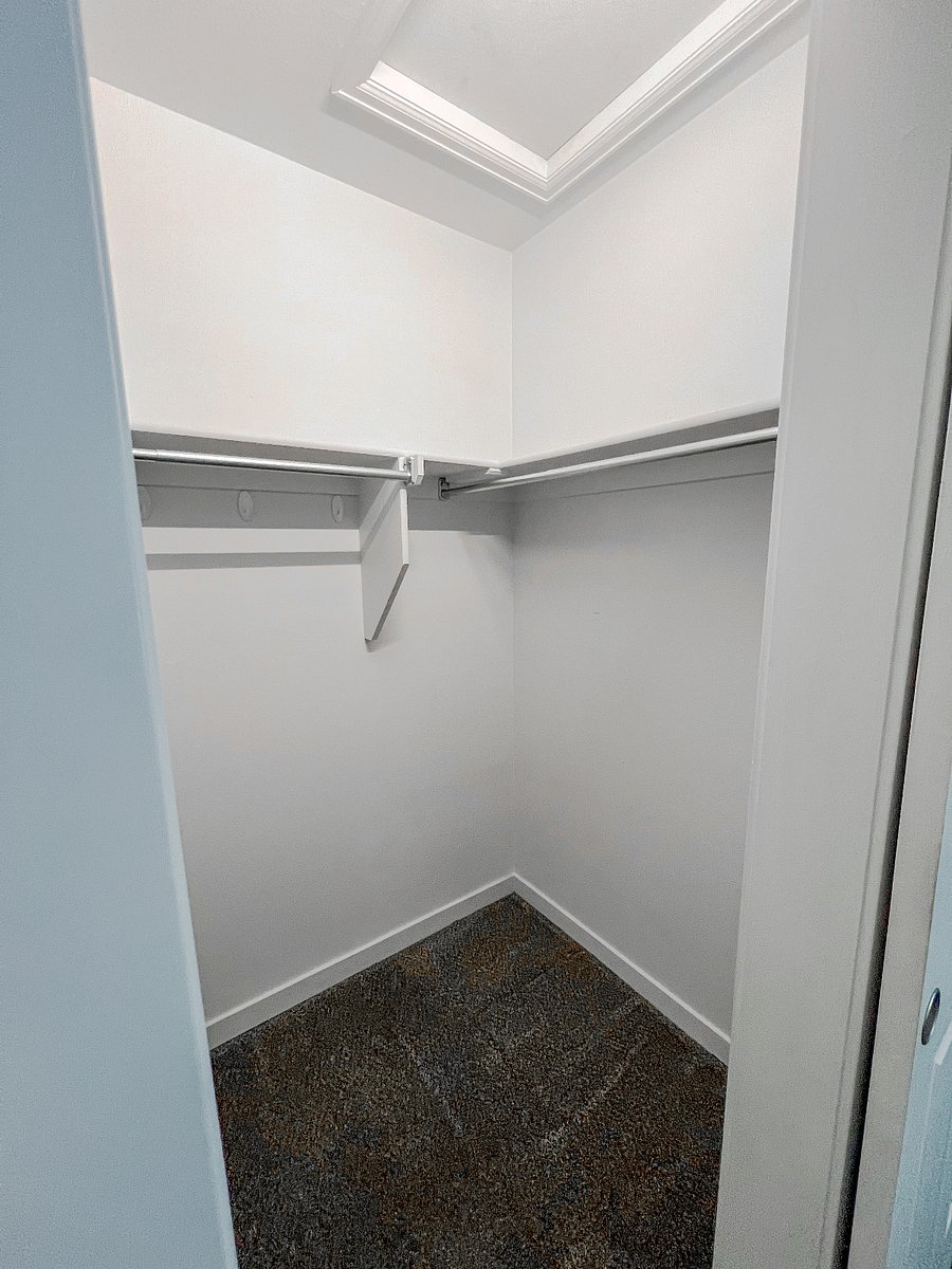 Walk in closet in master bedroom