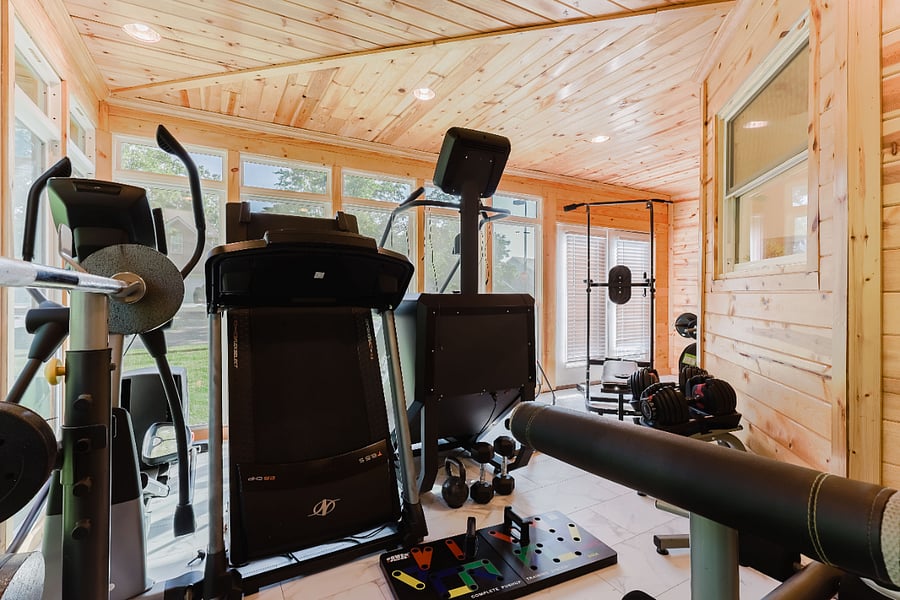 Gym with stairmaster and treadmill