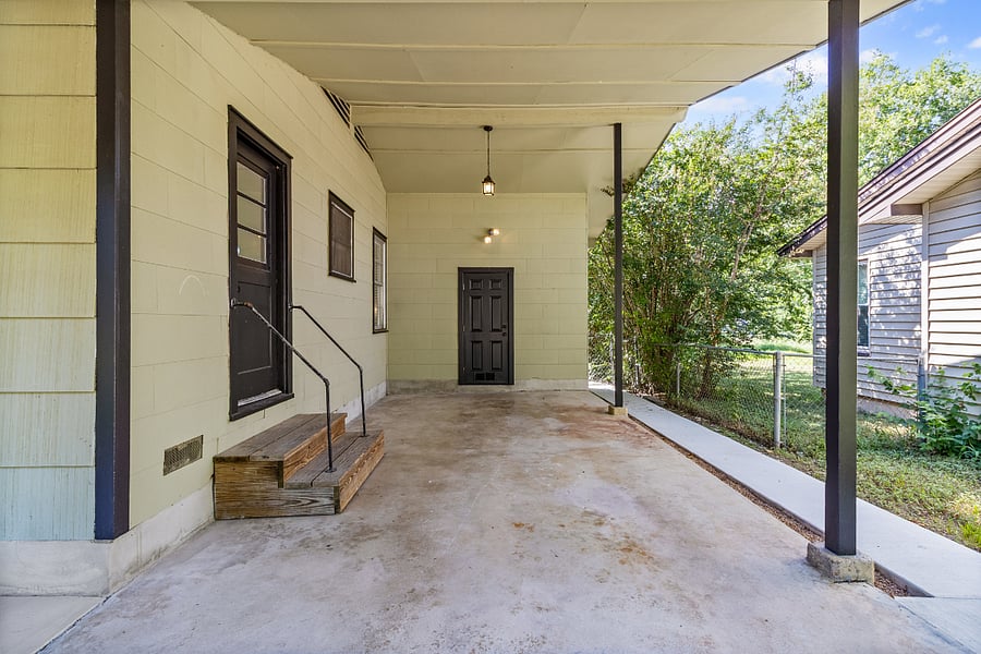 Stay out of the Texas sun with a shaded, on-site carport.