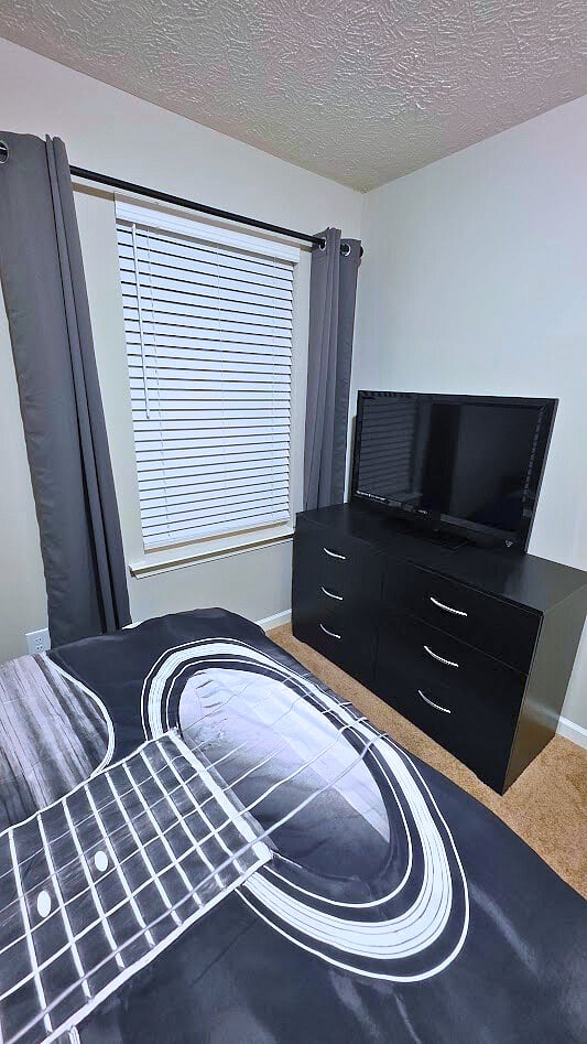 Full dressers, TV and Blackout curtains