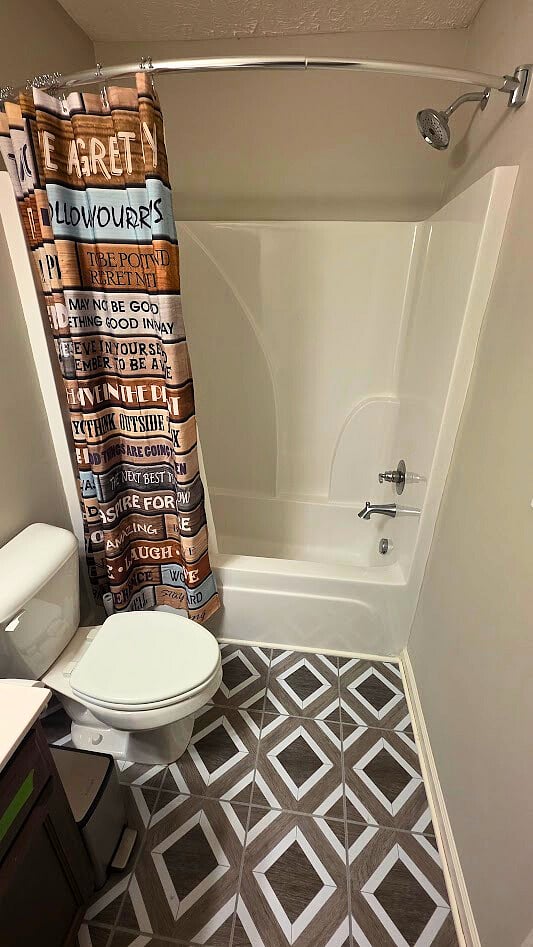 Full size showers and tubs in both bathrooms