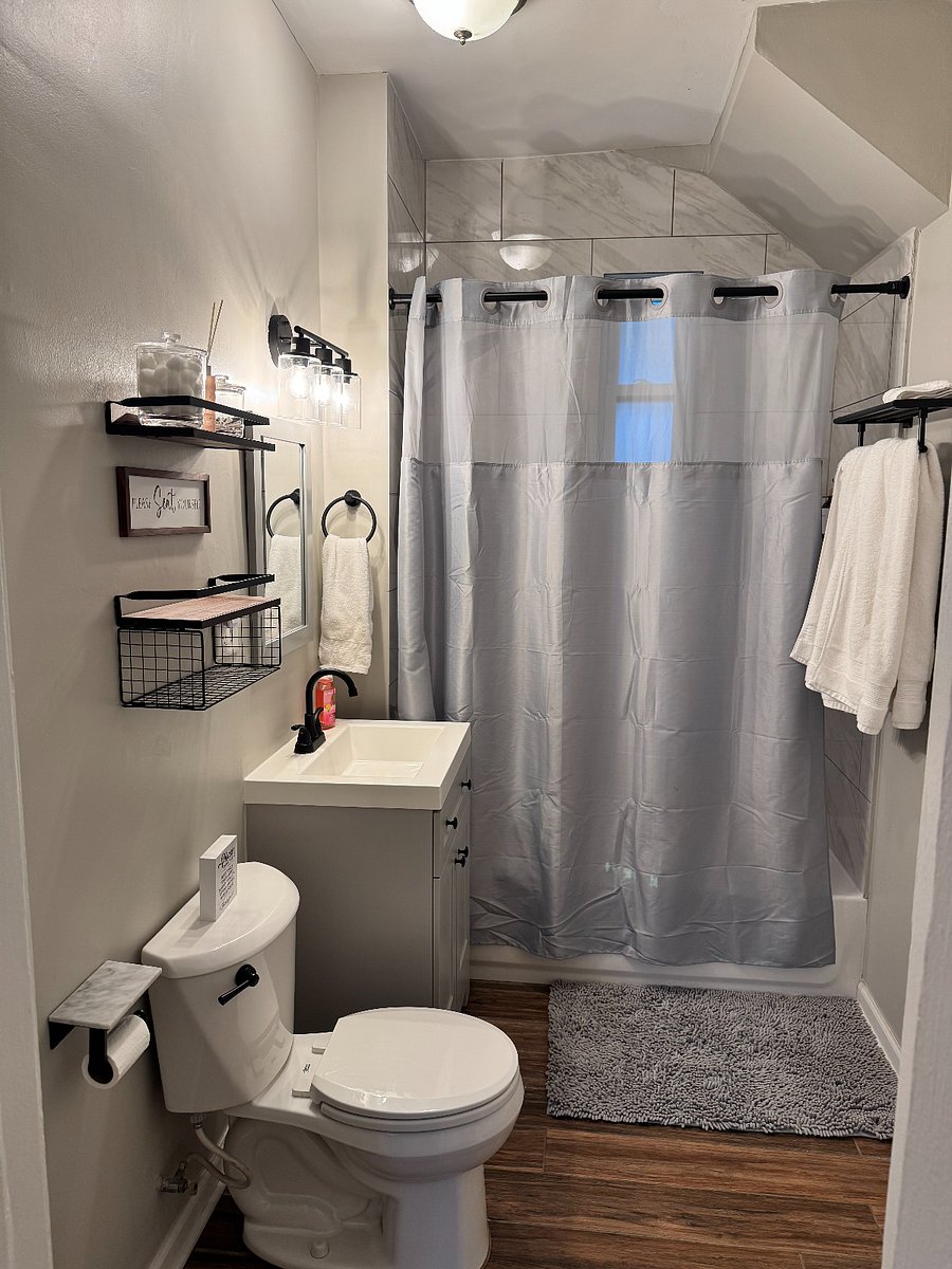 Bathroom, fully supplied with shampoo, conditioner, and body wash.