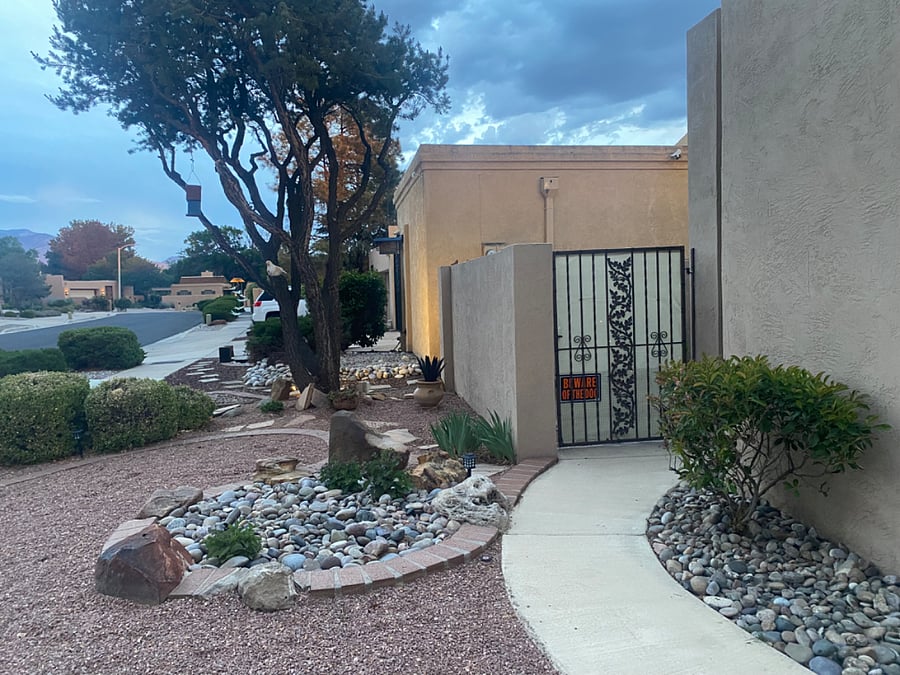Locked side yard gate.