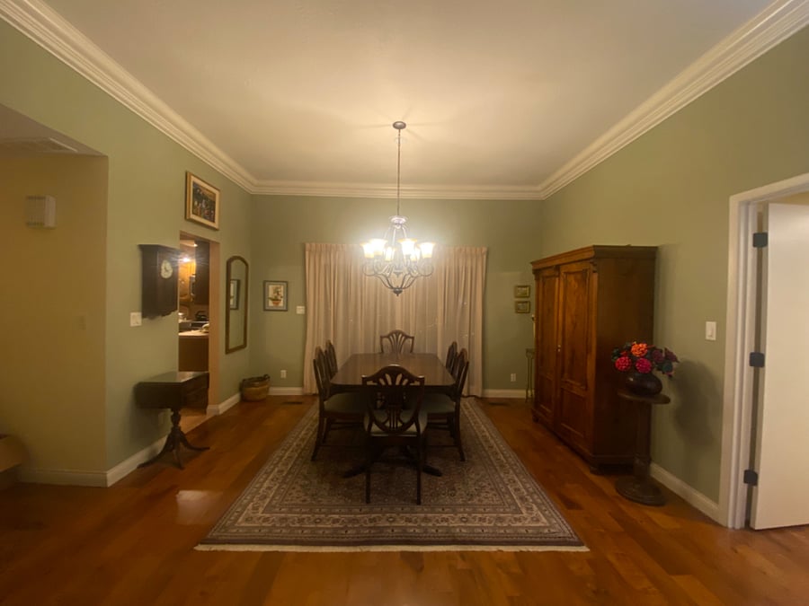 Dining area has room for more than 6 to gather comfortably! Cabinet has special occasion tableware and more!