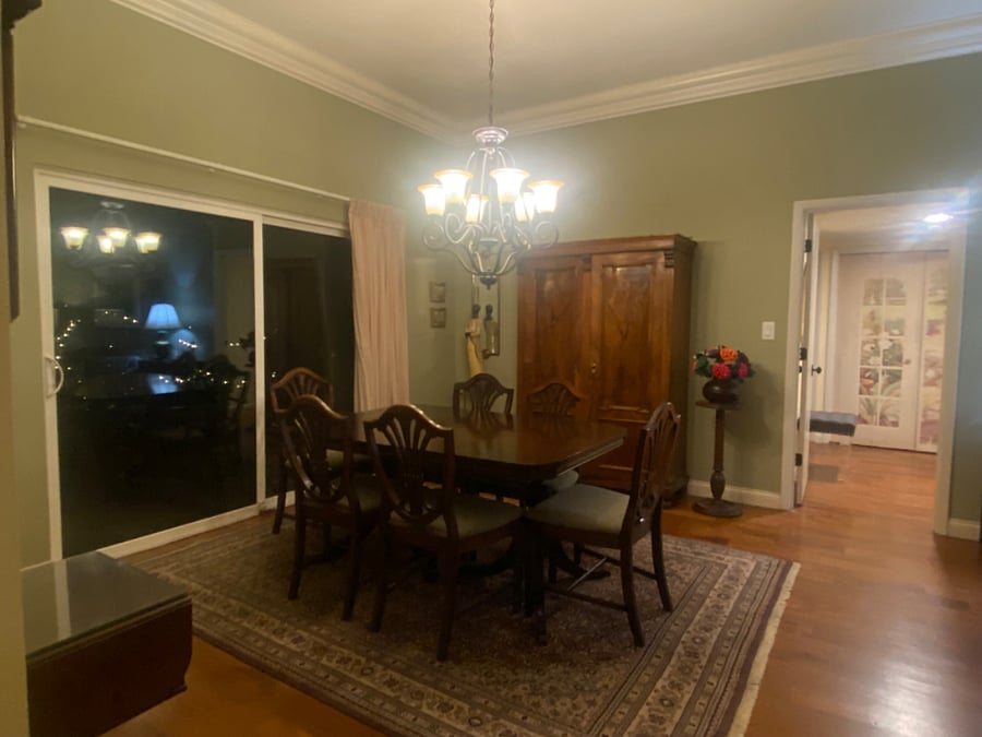 High ceilings in the dining room which flows right outside to covered porch area.