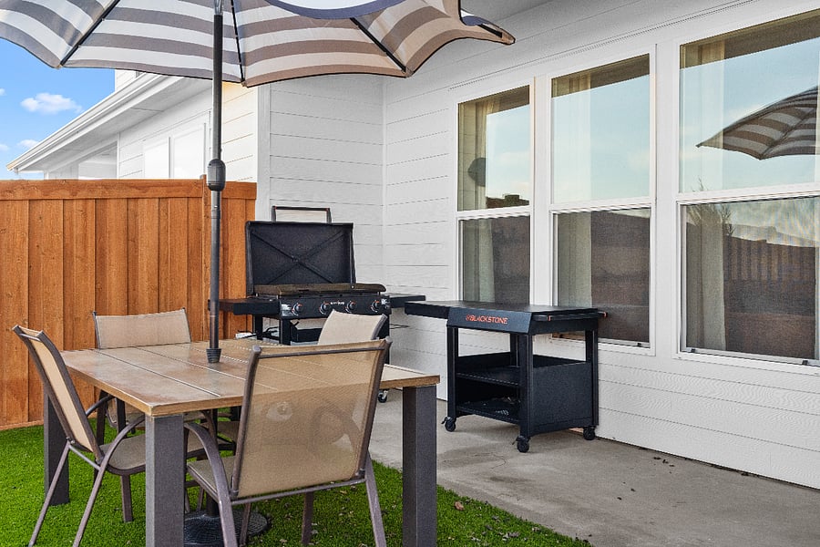 Backyard with Blackstone Grill and Outdoor Seating