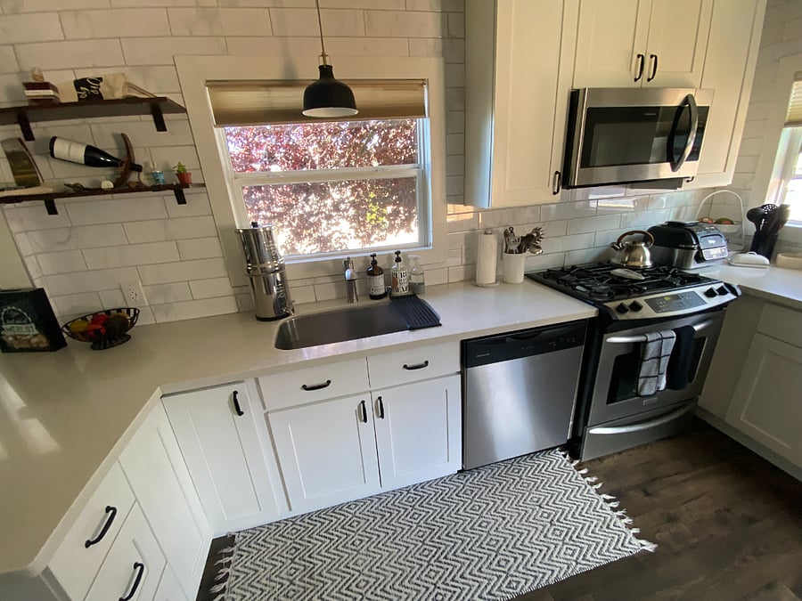 Stainless steel appliances including a sink disposal. Gas cooktop!