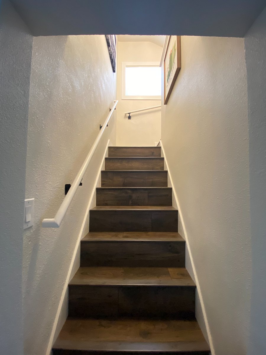 Stairs to second story/primary bedroom (#3) and bathroom 2