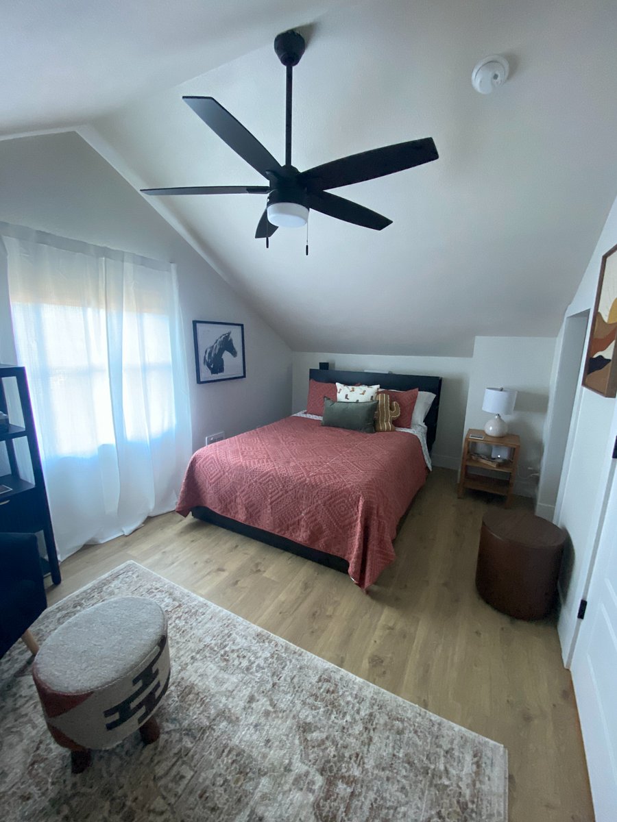 Bedroom 3 - Purple mattress; storage drawers under bed.