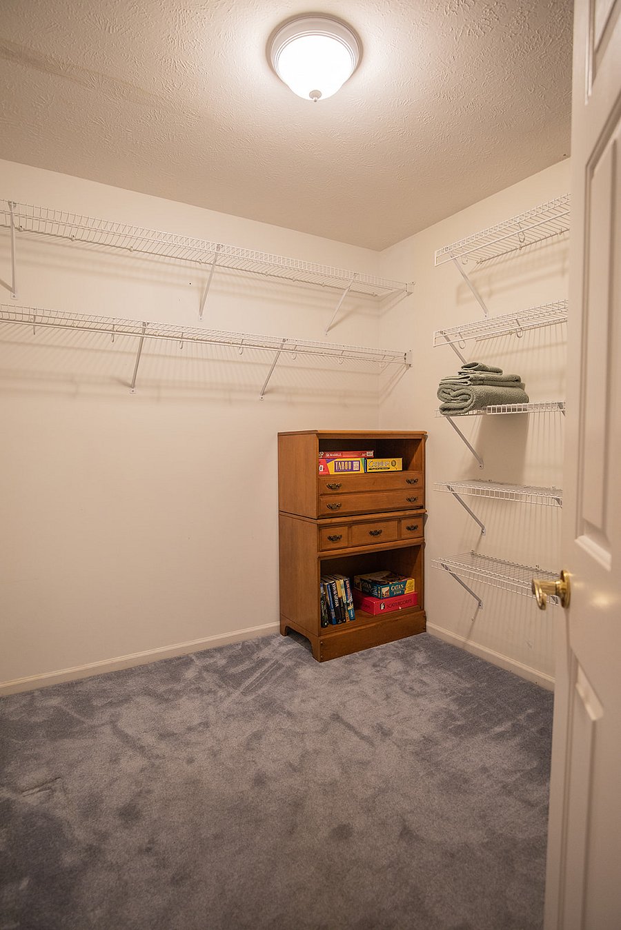 master walk-in closet; some games and books are available