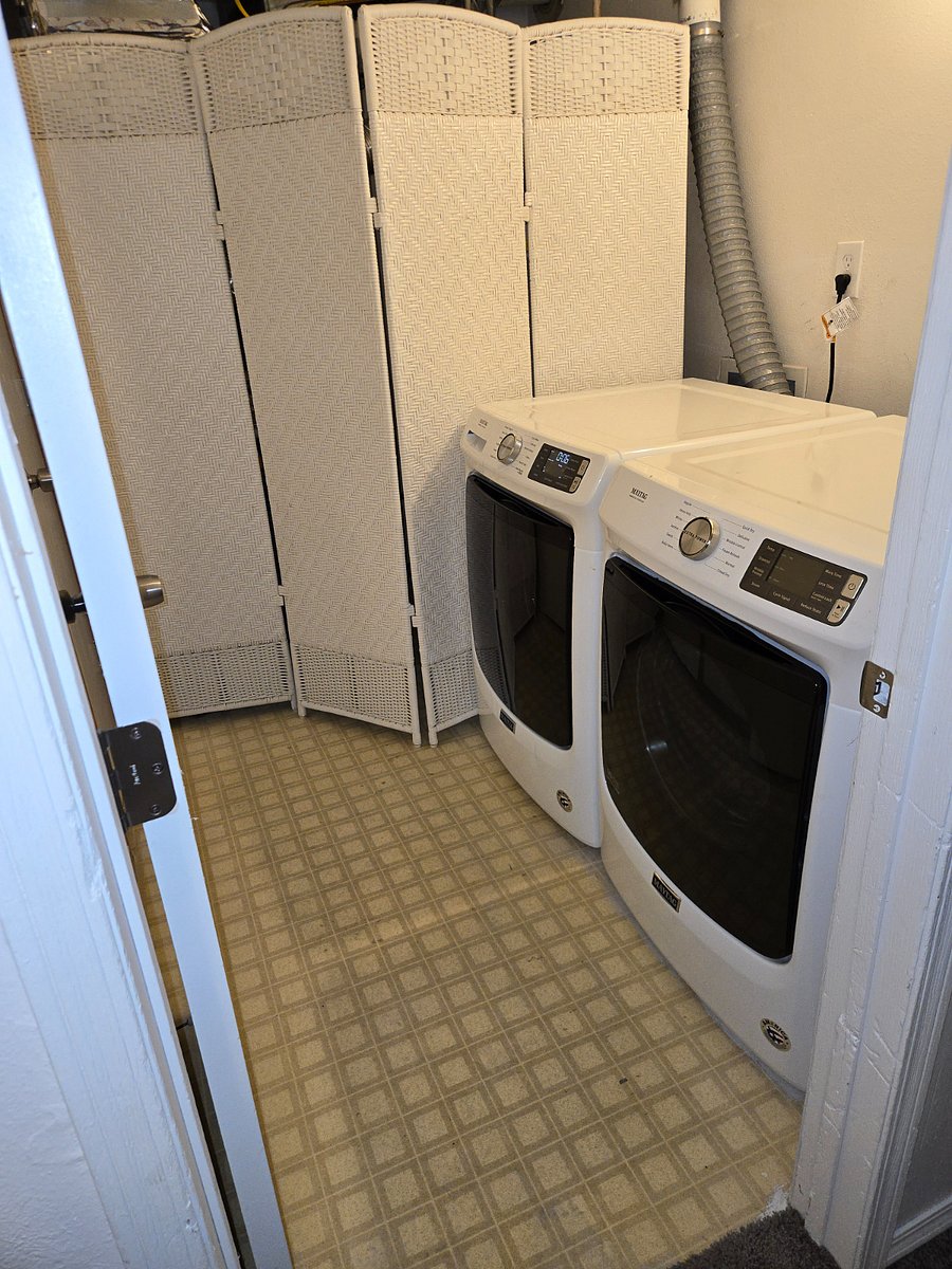Washer and dryer located downstairs in the basement