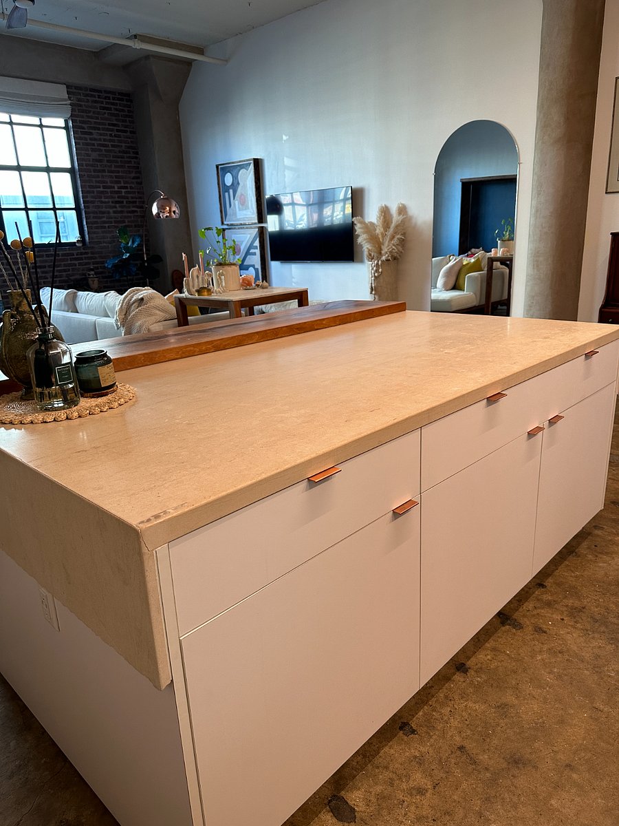 Large island with easy pull-out drawers with concealed garbage, recycling and spice rack