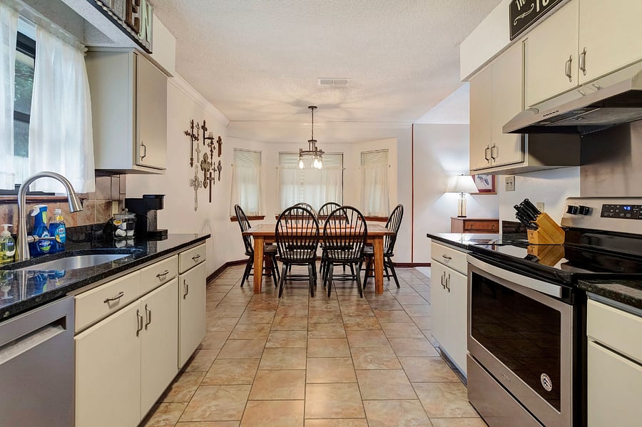 Kitchen and dining area; kitchen includes pantry closet and full sized refrigerator 