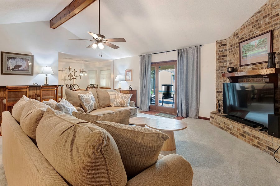 Living room and bar area. Fireplace cannot be used.